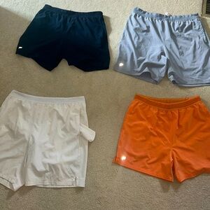 4 pairs of slightly worn men’s Fabletics shorts,